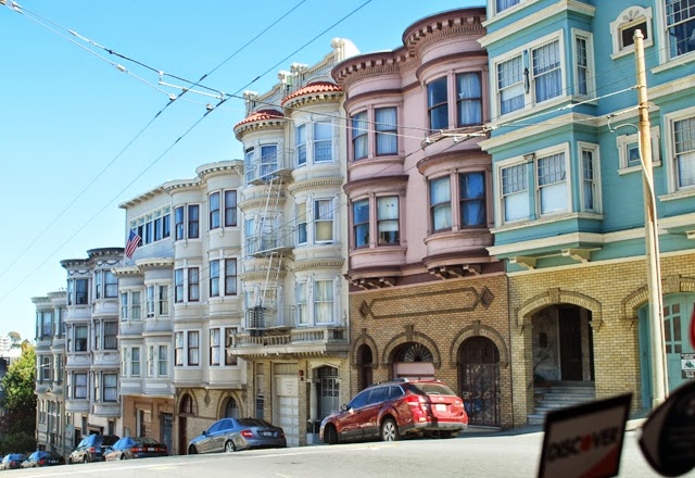 Colorful townhomes lining the streets of San Francisco, California | Em Then Now When